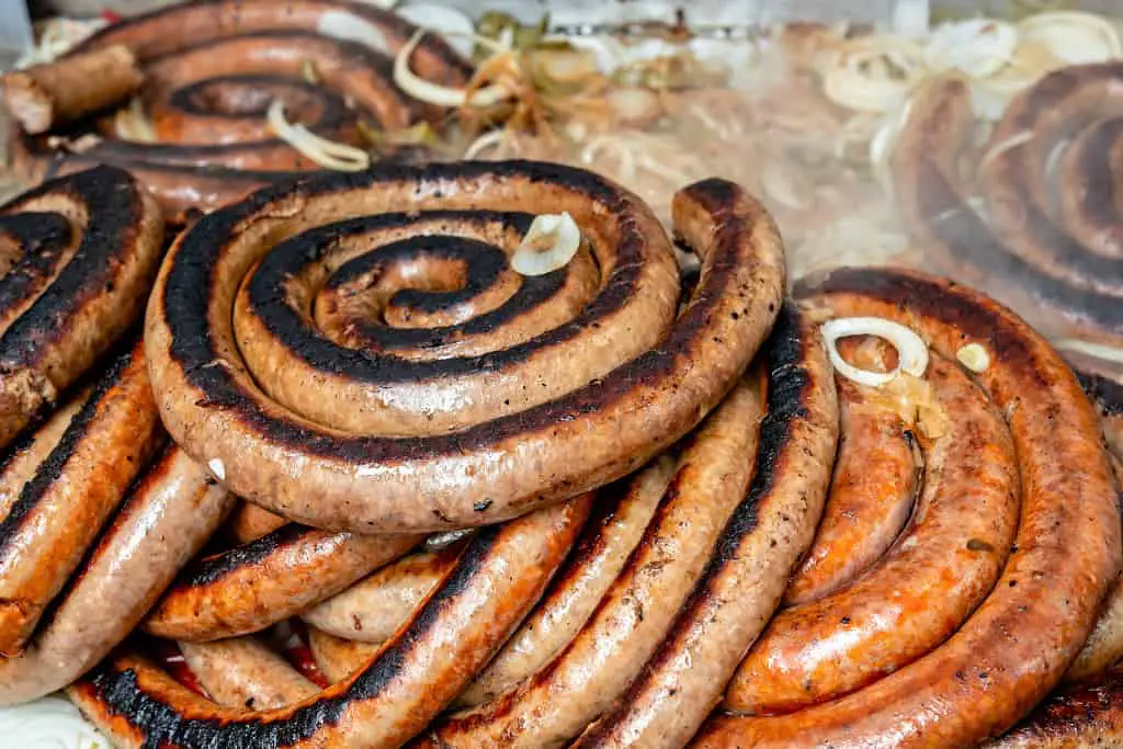 smoked sausage with onions and sauce